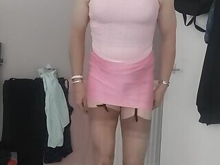 Crossdresser holly with a bulge in her skirt
