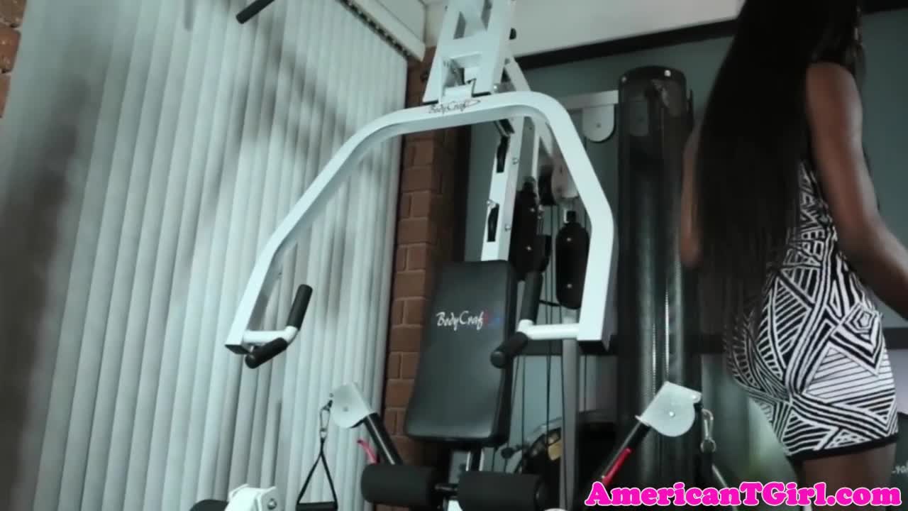 Black transbabe jerks her cock after workout