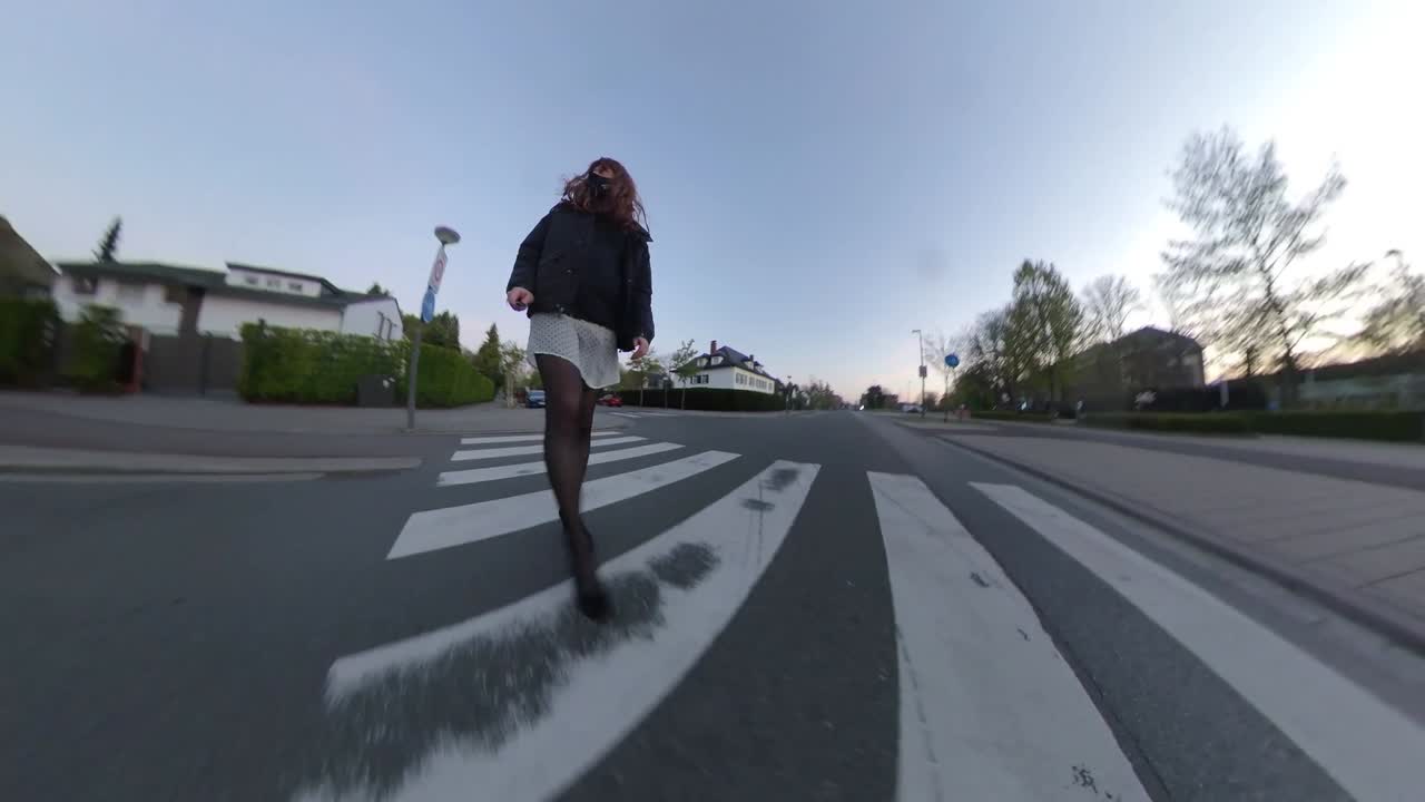 Walking on the street in sheer skirt